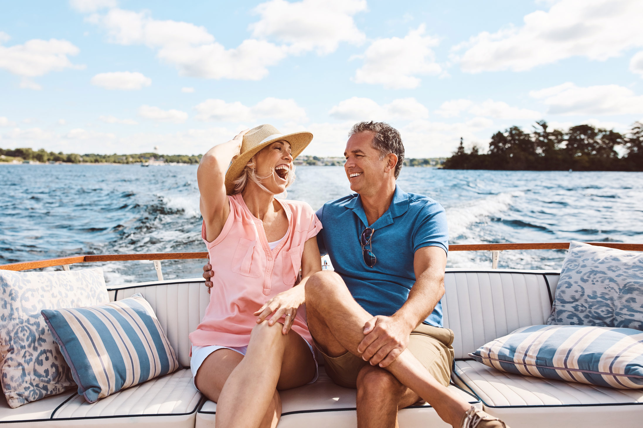 Happy couple enjoying a boat ride on Lake Hartwell
